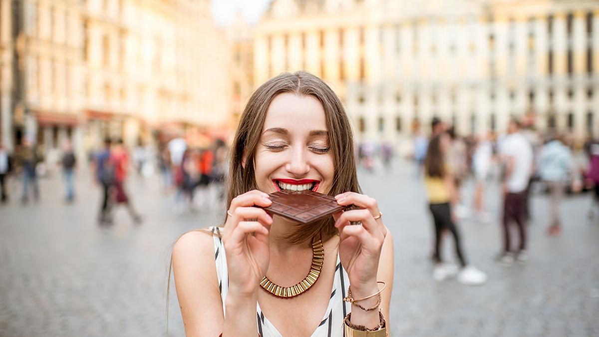 Article Cards Featured Image Woman with chocolate outdoors in Brussels