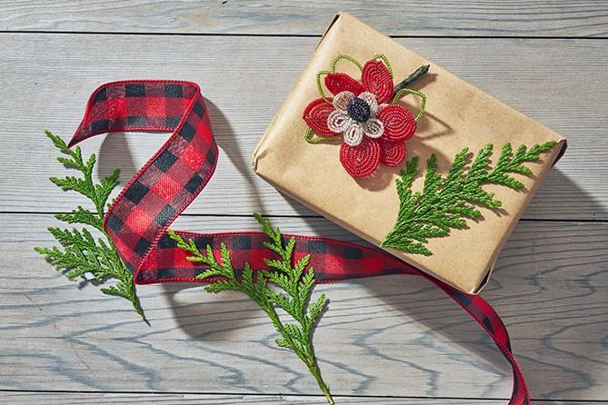 Christmas wrapping paper and greenery.