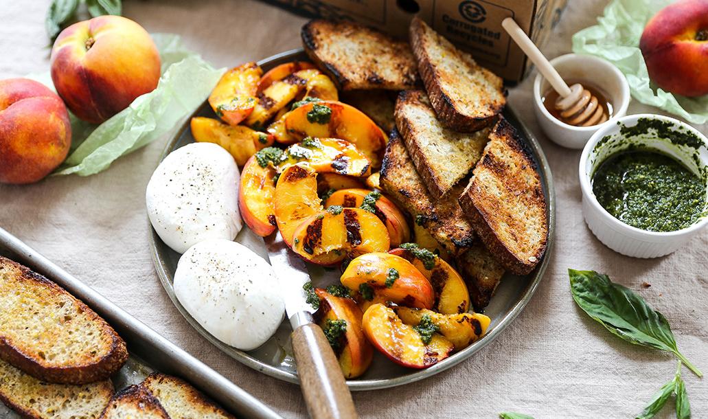 Grilled Peaches and Burrata With Basil Pesto and Honey