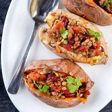 Sweet potato turkey chili in sweet potato skins.