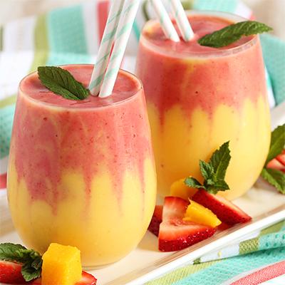 Mango recipes with two mango strawberry smoothies.